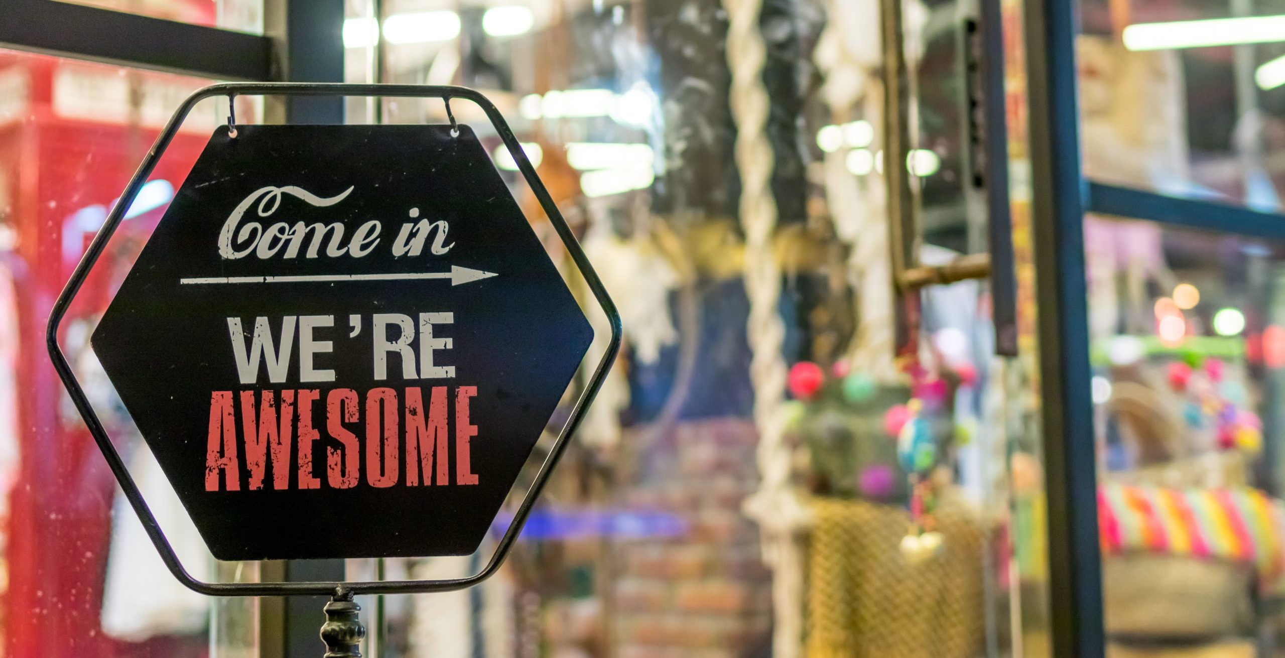 A sign that says we 're awesome on it.