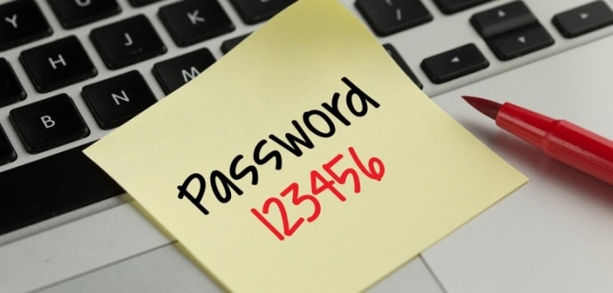 A yellow sticky note with the word password written on it.
